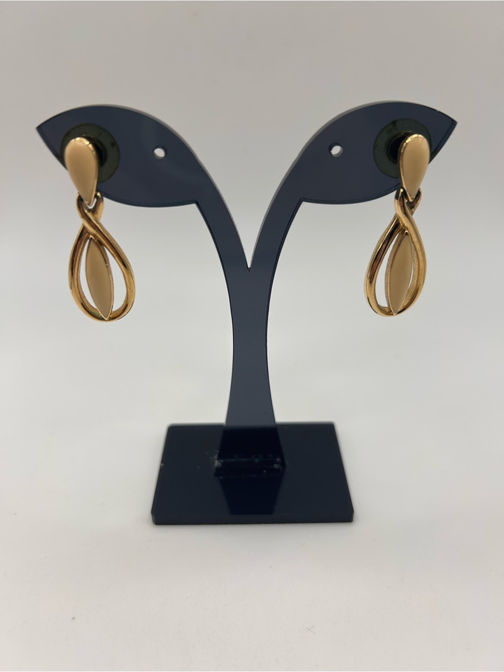 Vintage Trifari gold tone cream enamel dangly earrings